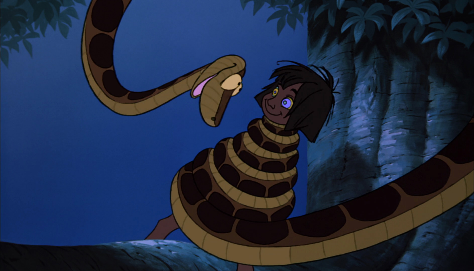 Mowgli_is_being_hypnotized_and_is_wraped_up_in_Kaa_the_python's_coils.jpg